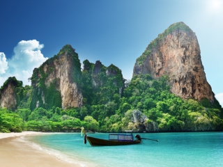 Boat And Rocks In Thailand wallpaper 320x240