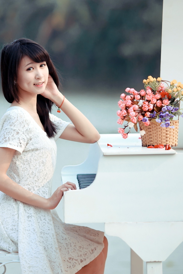 Fondo de pantalla Young Asian Girl By Piano 640x960