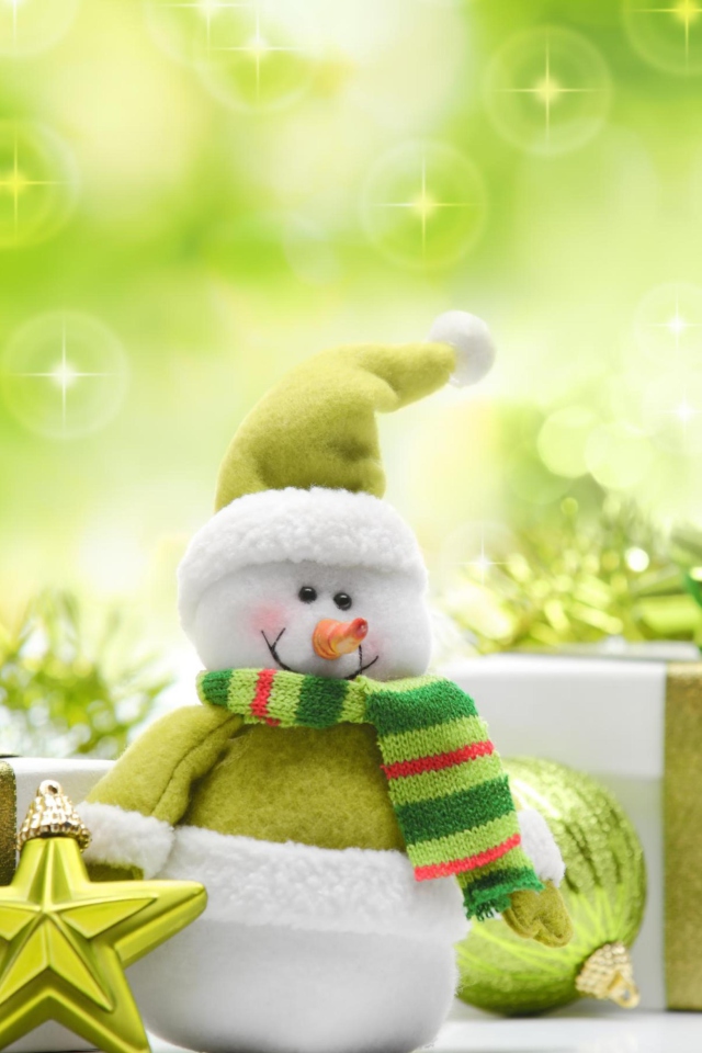 Das Cute Green Snowman Wallpaper 640x960
