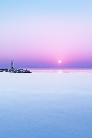 Fondo de pantalla Lighthouse On Sea Pier At Dawn 320x480
