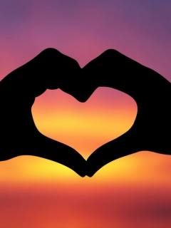 Sfondi Hands Making A Heart In The Sunset 240x320