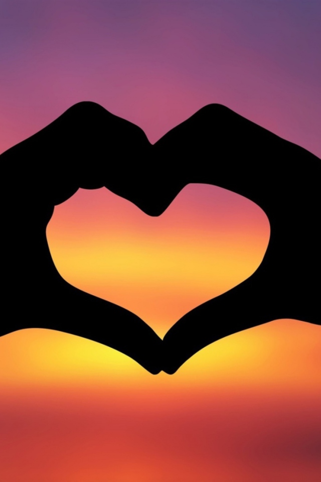 Sfondi Hands Making A Heart In The Sunset 640x960