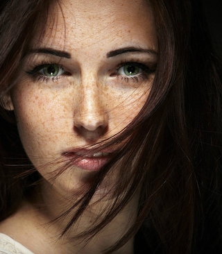 Brunette With Freckles Wallpaper for Nokia C1-01