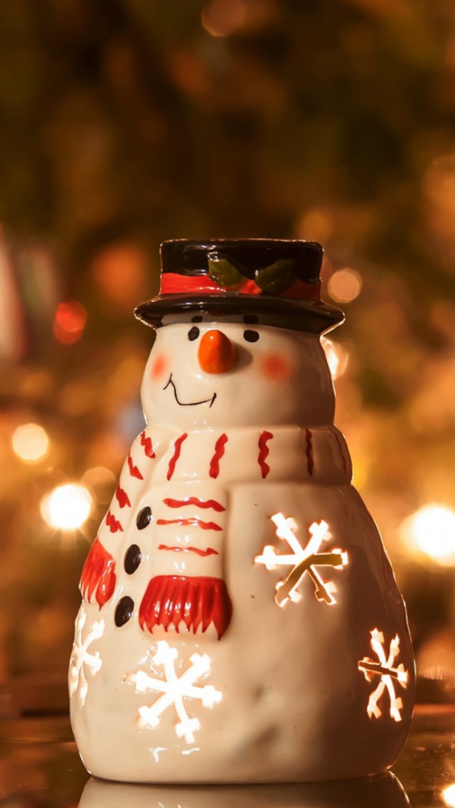 Fondo de pantalla Christmas Snowman Candle 640x1136