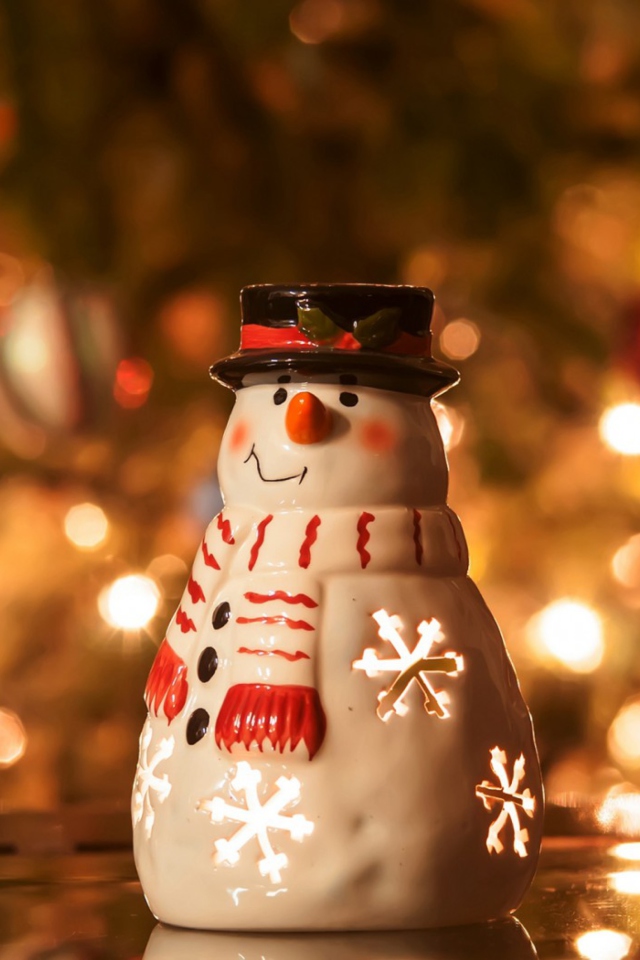 Fondo de pantalla Christmas Snowman Candle 640x960