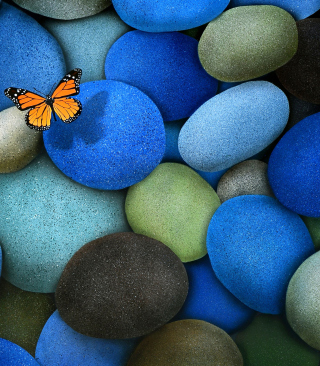 Kostenloses Orange Butterfly On Blue Stones Wallpaper für HTC HD7