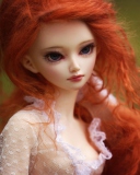 Sfondi Gorgeous Redhead Doll With Sad Eyes 128x160