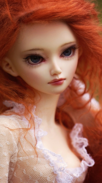 Обои Gorgeous Redhead Doll With Sad Eyes 360x640