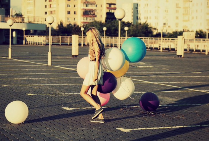 Happy Girl With Colorful Balloons wallpaper