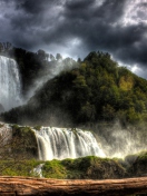 Screenshot №1 pro téma Storm Over Waterfall 132x176