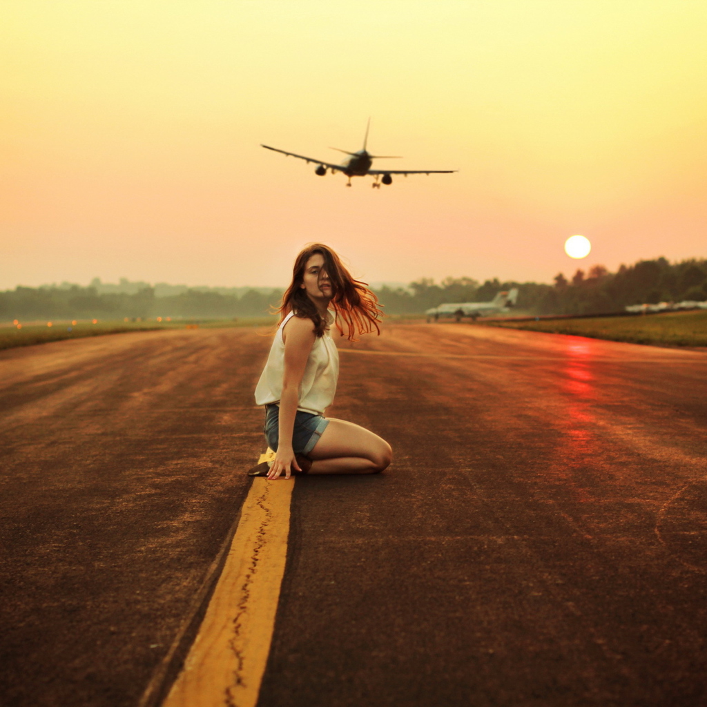 Airplane Over Girl's Head wallpaper 1024x1024