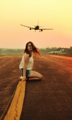Airplane Over Girl's Head wallpaper 240x400