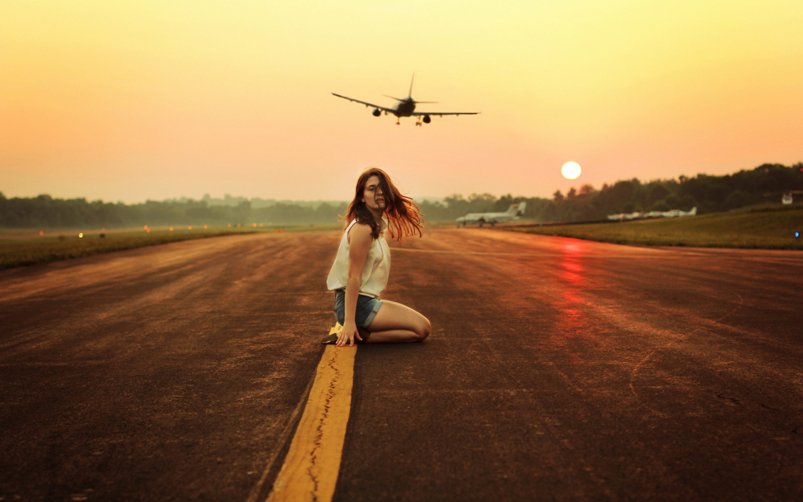 Airplane Over Girl's Head wallpaper 2560x1600