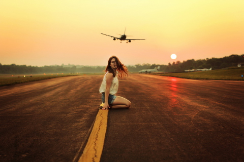 Airplane Over Girl's Head wallpaper 480x320