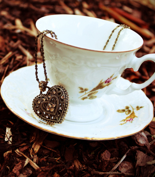Heart Pendant And Vintage Cup Wallpaper for 240x320