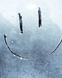 Smiley Face On Frozen Window wallpaper 128x160
