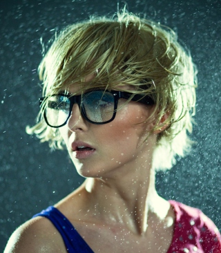 Cute Blonde Girl Wearing Glasses Wallpaper for Nokia Asha 306