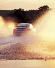 Fondo de pantalla Porsche GT2 In Water Splashes 176x220