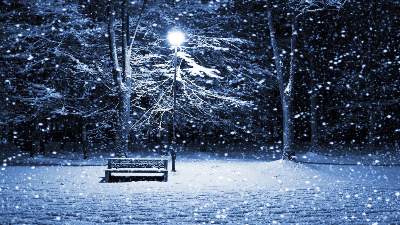 Lonely Bench In Snowy Night screenshot #1 1366x768