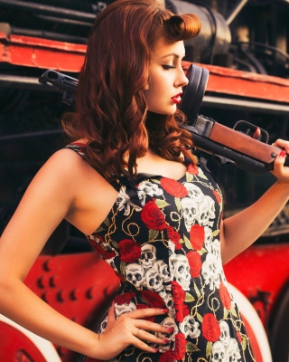 Free Pin up model with Gun Picture for Nokia Asha 311
