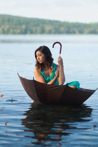 Girl With Umbrella On Lake wallpaper 320x480