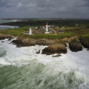 Lighthouse On Hill And Big Waves wallpaper 128x128