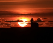 Screenshot №1 pro téma Lighthouse At Sunset 176x144