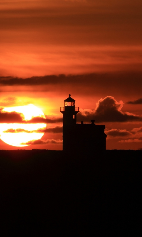 Обои Lighthouse At Sunset 480x800