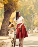 Обои Romantic Girl With Bicycle And Flowers 128x160