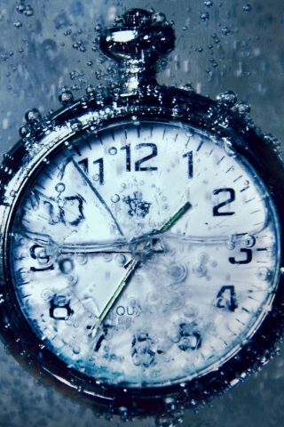 Fondo de pantalla Frozen Time Clock 320x480