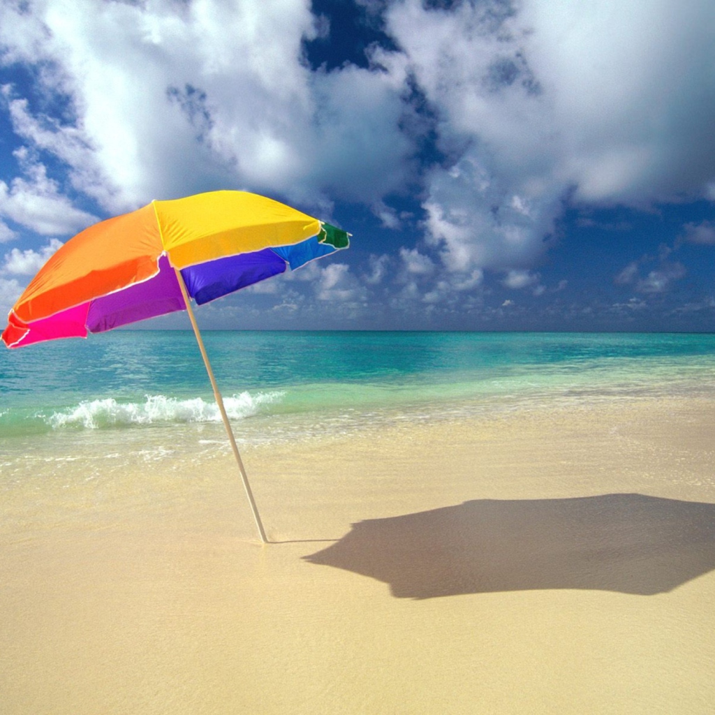 Sfondi Rainbow Umbrella At Beach 1024x1024