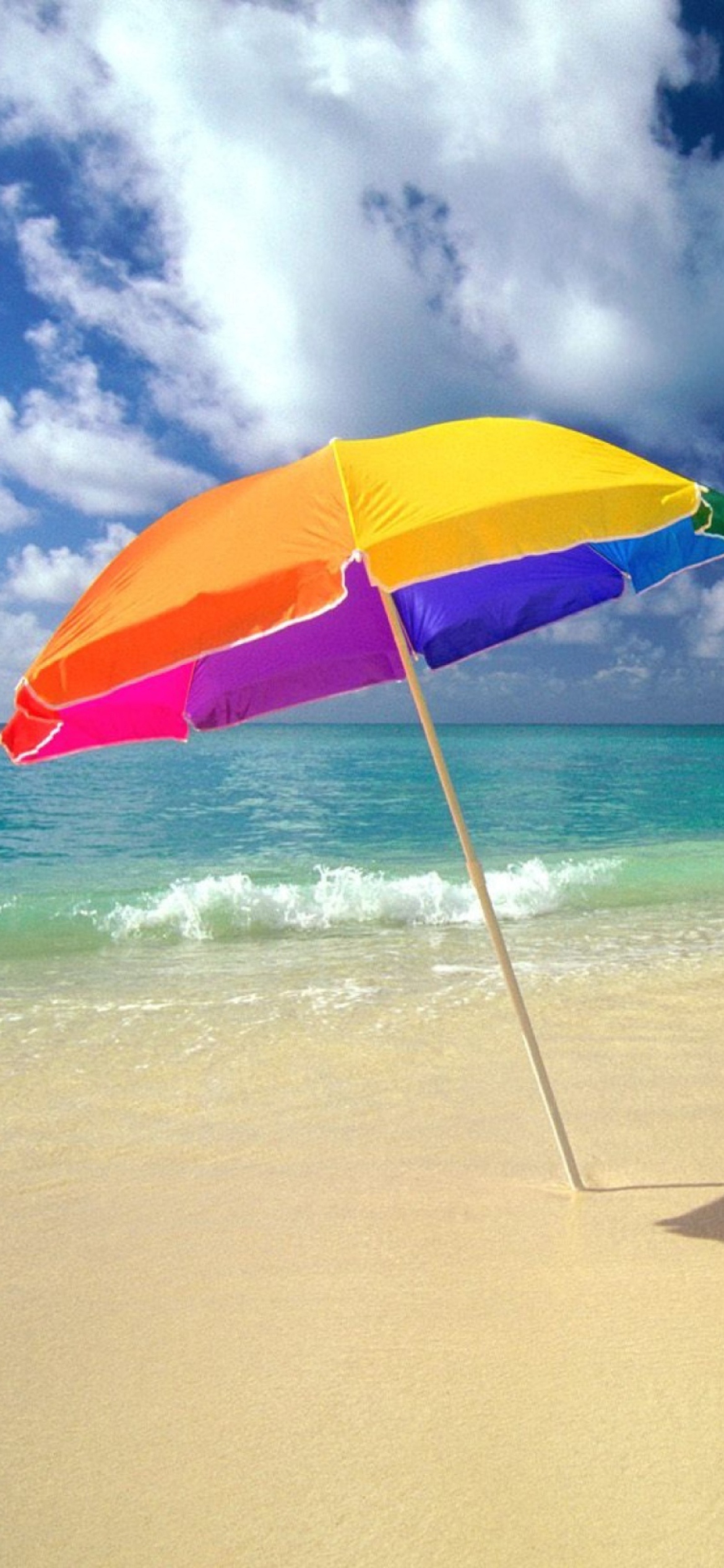 Sfondi Rainbow Umbrella At Beach 1170x2532