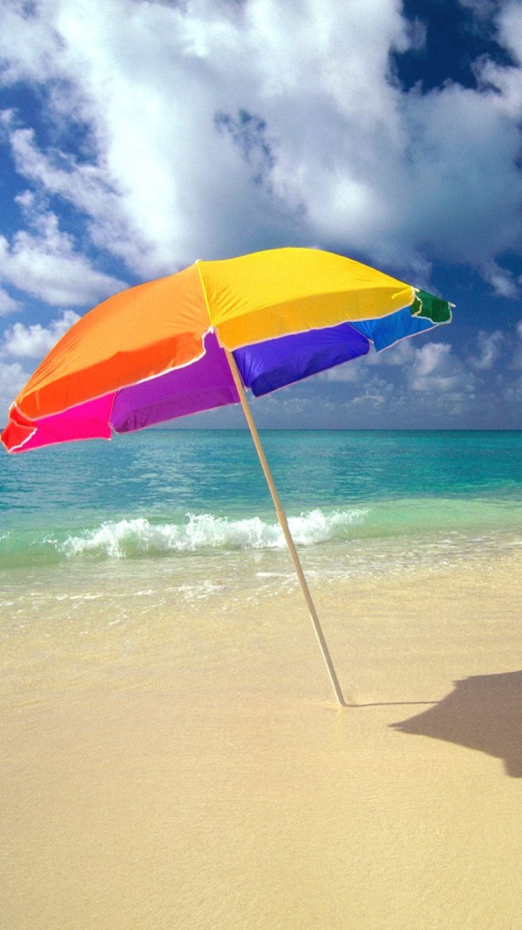 Das Rainbow Umbrella At Beach Wallpaper 750x1334