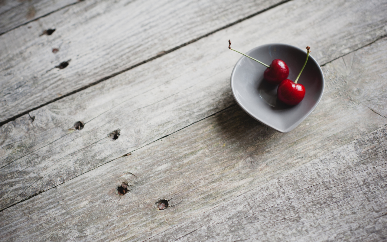 Sfondi Two Red Cherries On Plate On Wooden Table 1280x800