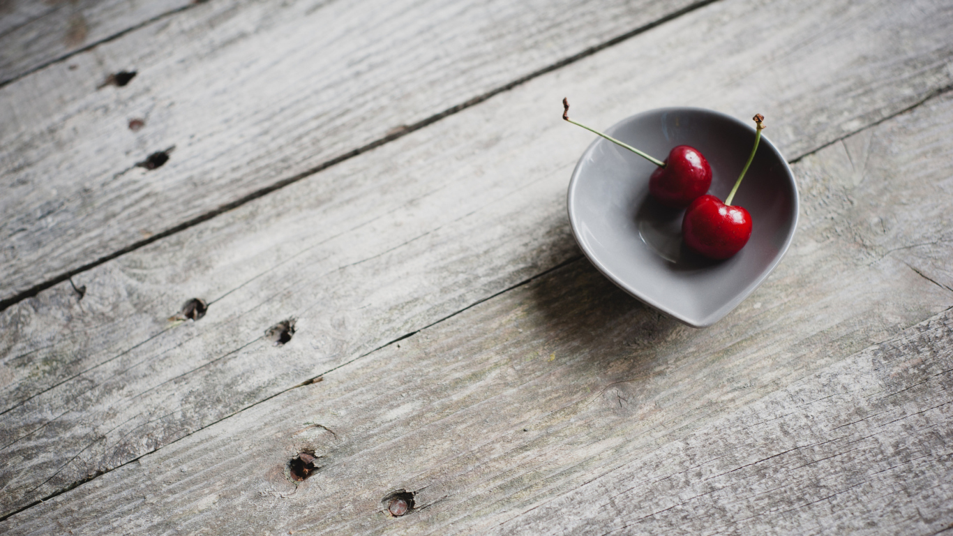 Screenshot №1 pro téma Two Red Cherries On Plate On Wooden Table 1366x768