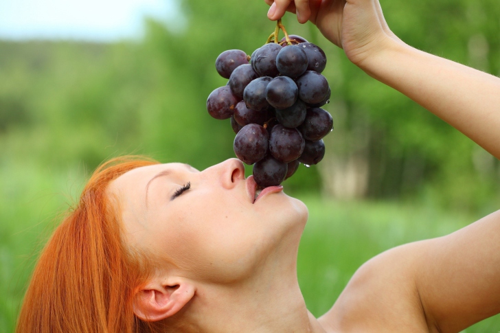 Eating Grapes wallpaper