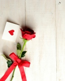 Fondo de pantalla Love Letter And Red Rose 128x160