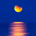 Das Orange Moon In Blue Sky Wallpaper 128x128