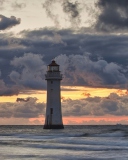 Massive Clouds Above Lighthouse wallpaper 128x160