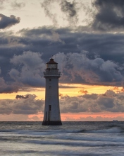 Massive Clouds Above Lighthouse wallpaper 176x220