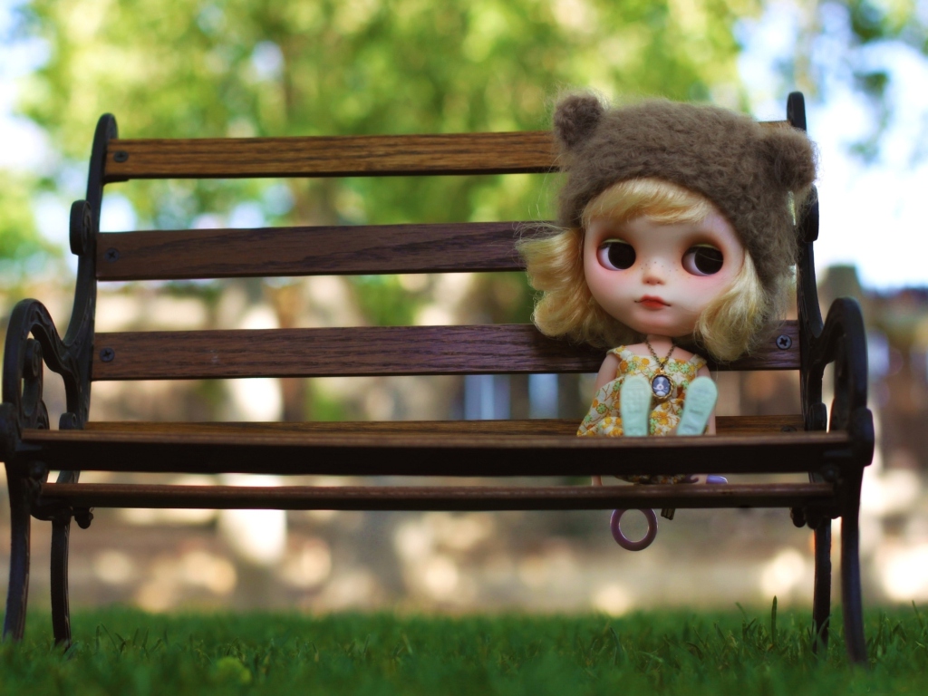 Doll Sitting On Bench wallpaper 1024x768