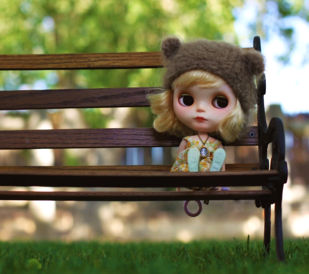 Das Doll Sitting On Bench Wallpaper 1080x960