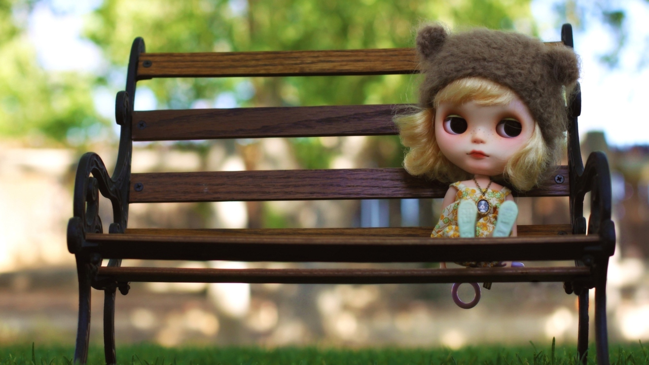 Doll Sitting On Bench wallpaper 1280x720