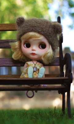 Das Doll Sitting On Bench Wallpaper 240x400