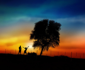 Das Couple Silhouettes Under Tree At Sunset Wallpaper 176x144