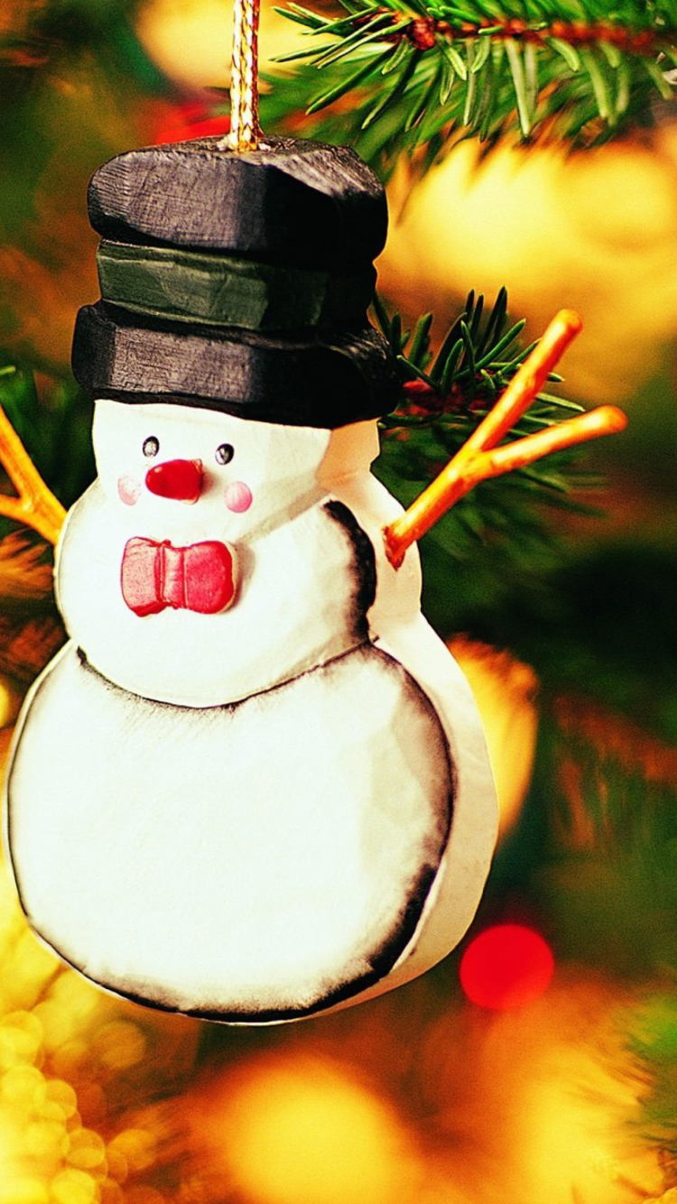 Обои Christmas Snowman Craft 750x1334