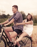 Couple On Bicycle wallpaper 128x160
