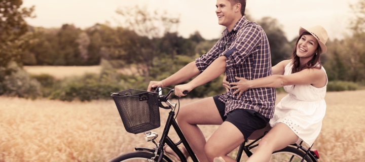 Couple On Bicycle wallpaper 720x320