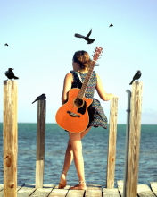Screenshot №1 pro téma Girl With Guitar On Sea 176x220