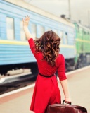 Girl traveling from train station wallpaper 128x160